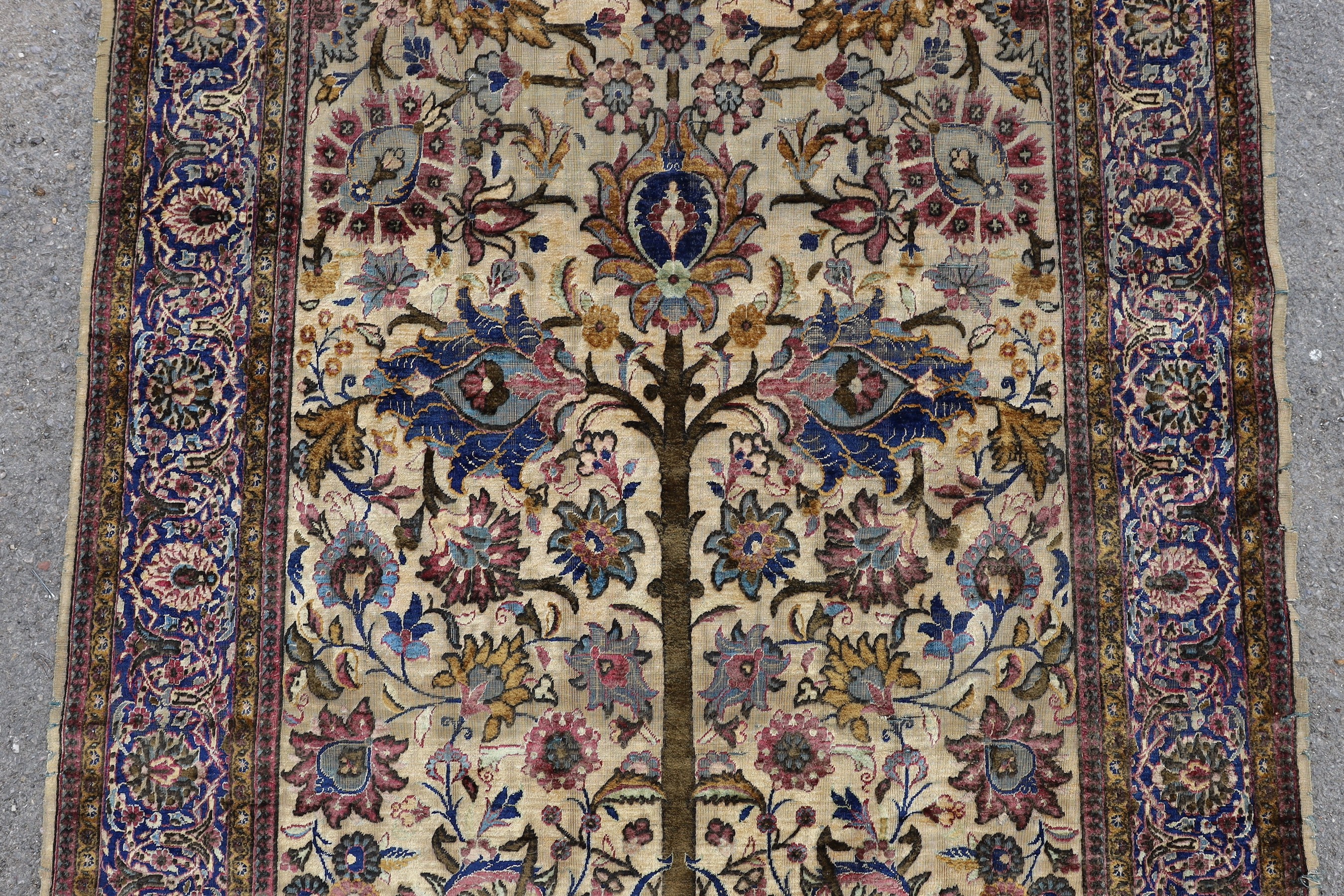 A Persian tree of life silk rug, 206 x 128cm